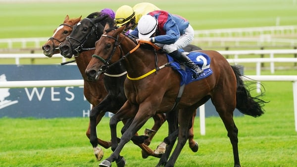 Caught U Looking (near side) 
finished nine lengths behind the now-retired Ezeliya in the Oaks at Epsom