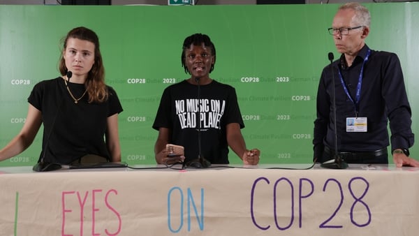 Vanessa Nakate (centre), a climate activist from Uganda speaks at a COP28 event.