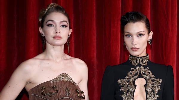 Gigi and Bella Hadid (pictured in Milan in February 2022) - Money has been earmarked for equal distribution among four humanitarian organisations that have a focus on children and families