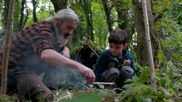 Tom Bán shows us how to light a fire.